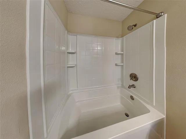 a view of swimming pool from a balcony