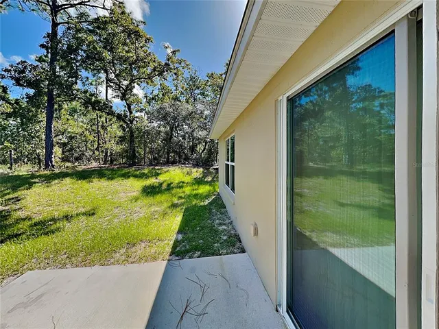 a view of a yard in front of a house