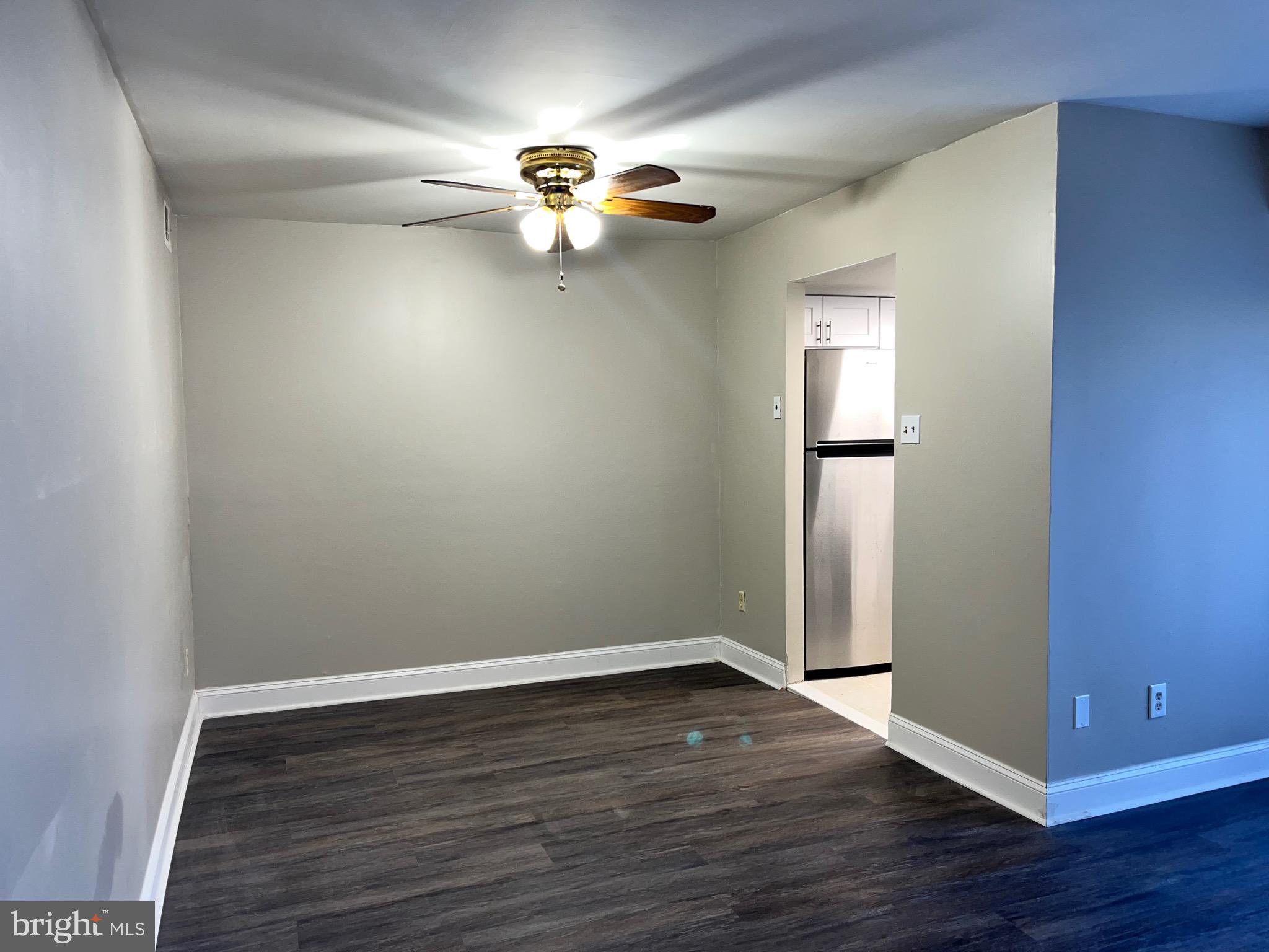 8030 Ditman Street, Unit 44H Philadelphia, PA 19136 - Photo 13 of 25 a view of an empty room with wooden floor