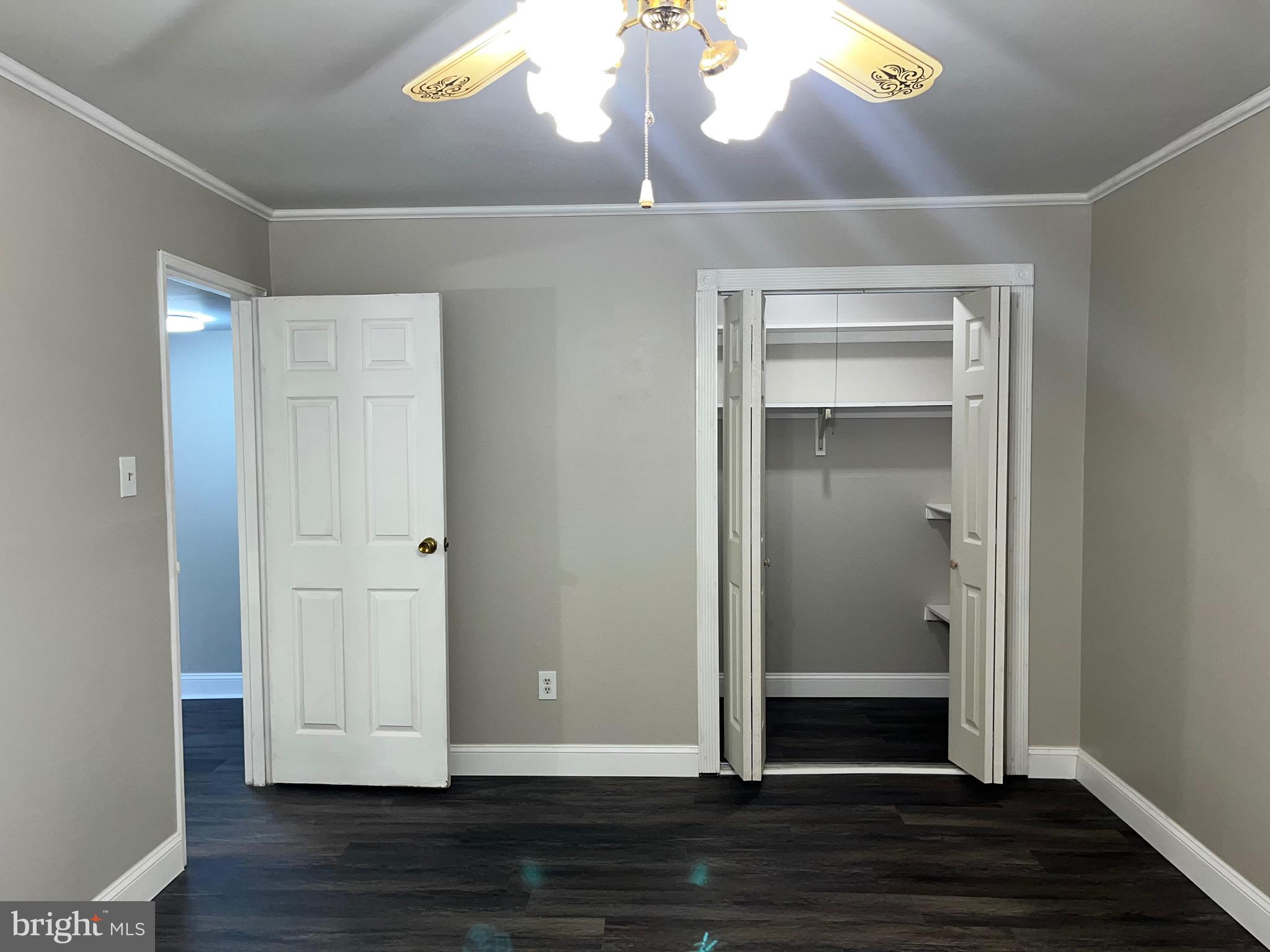 8030 Ditman Street, Unit 44H Philadelphia, PA 19136 - Photo 17 of 25 a view of empty room with wooden floor
