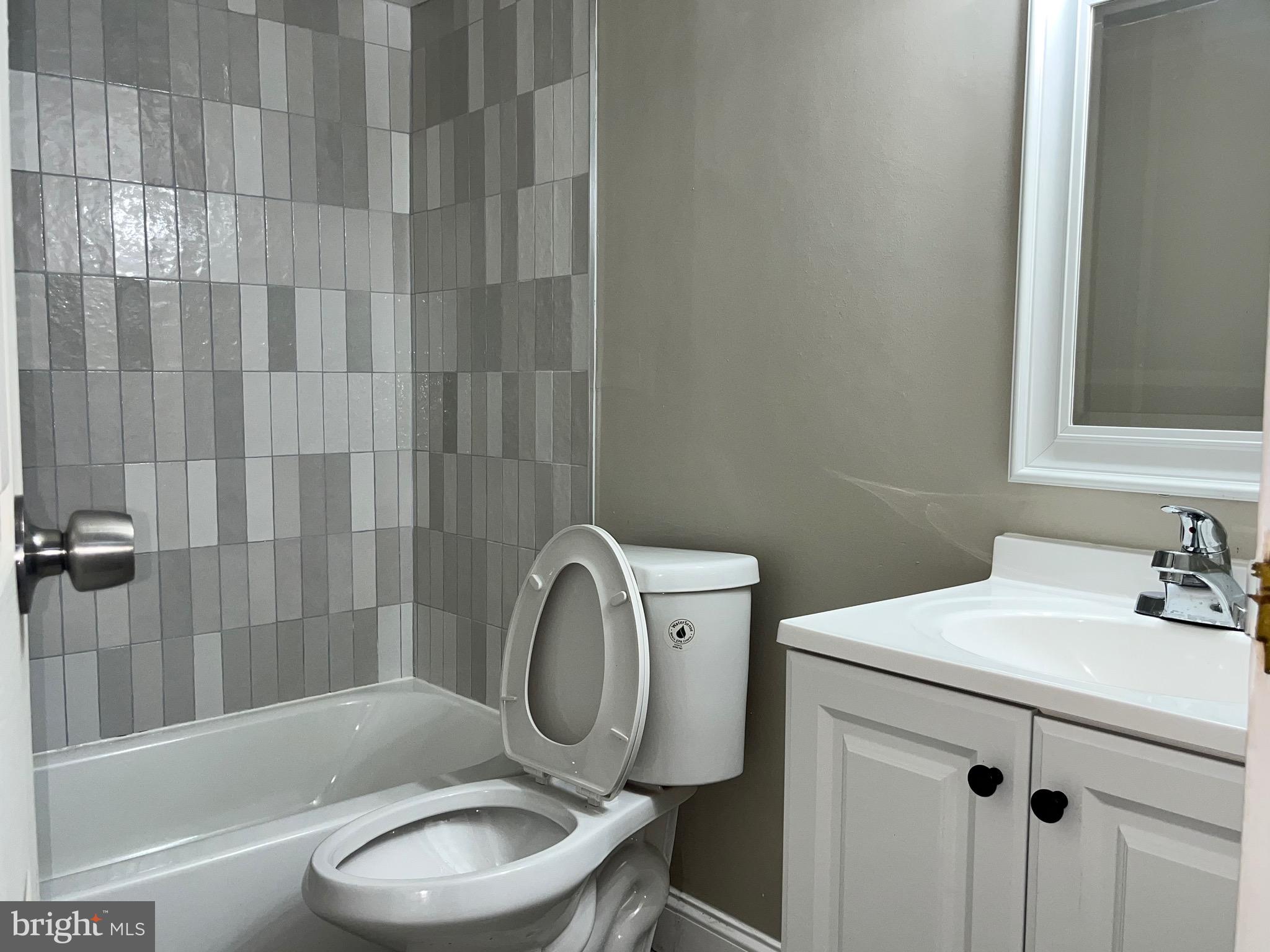 8030 Ditman Street, Unit 44H Philadelphia, PA 19136 - Photo 20 of 25 a bathroom with a sink toilet and shower