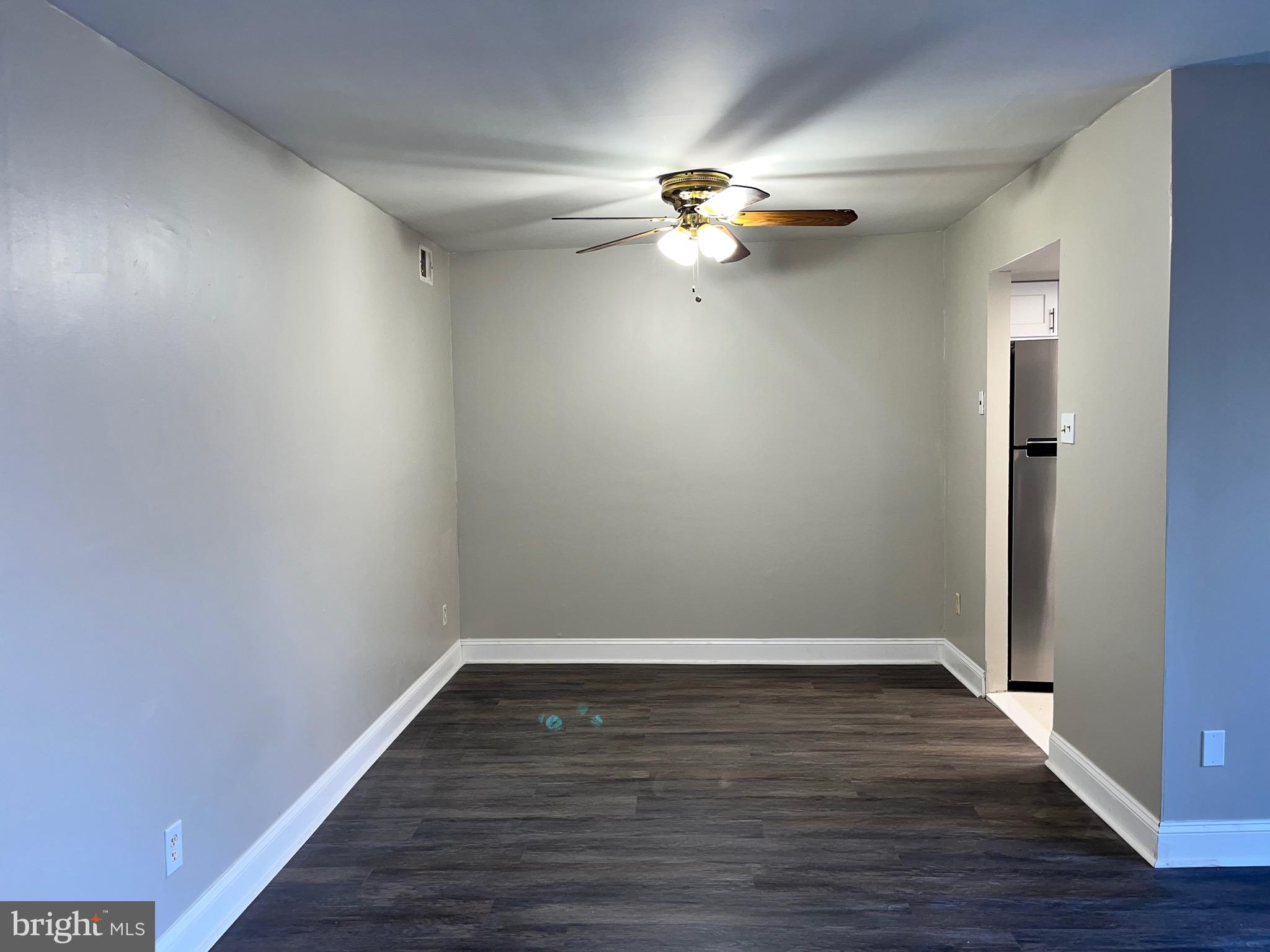 8030 Ditman Street, Unit 44H Philadelphia, PA 19136 - Photo 5 of 25 a view of empty room with wooden floor