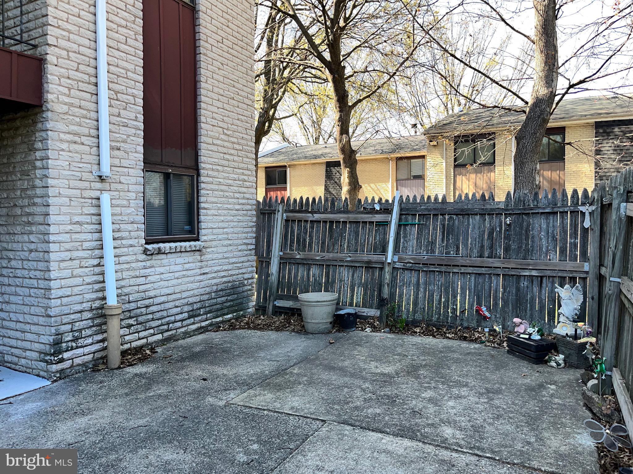 8030 Ditman Street, Unit 44H Philadelphia, PA 19136 - Photo 8 of 25 a view of a house with a backyard