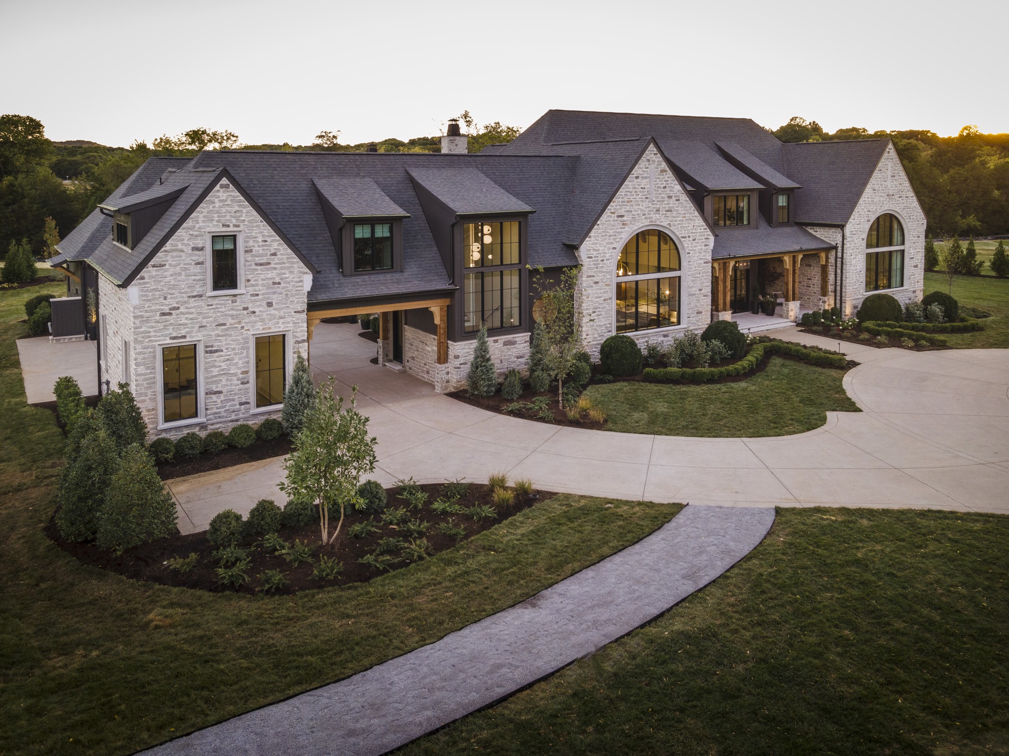 1549 Sunset Road Brentwood, TN 37027 - Photo 2 of 43 a front view of a house with a yard