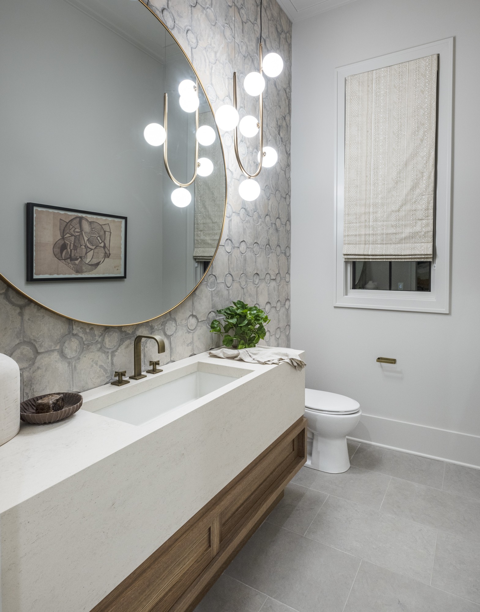 1549 Sunset Road Brentwood, TN 37027 - Photo 22 of 43 a bathroom with a sink a toilet and a mirror