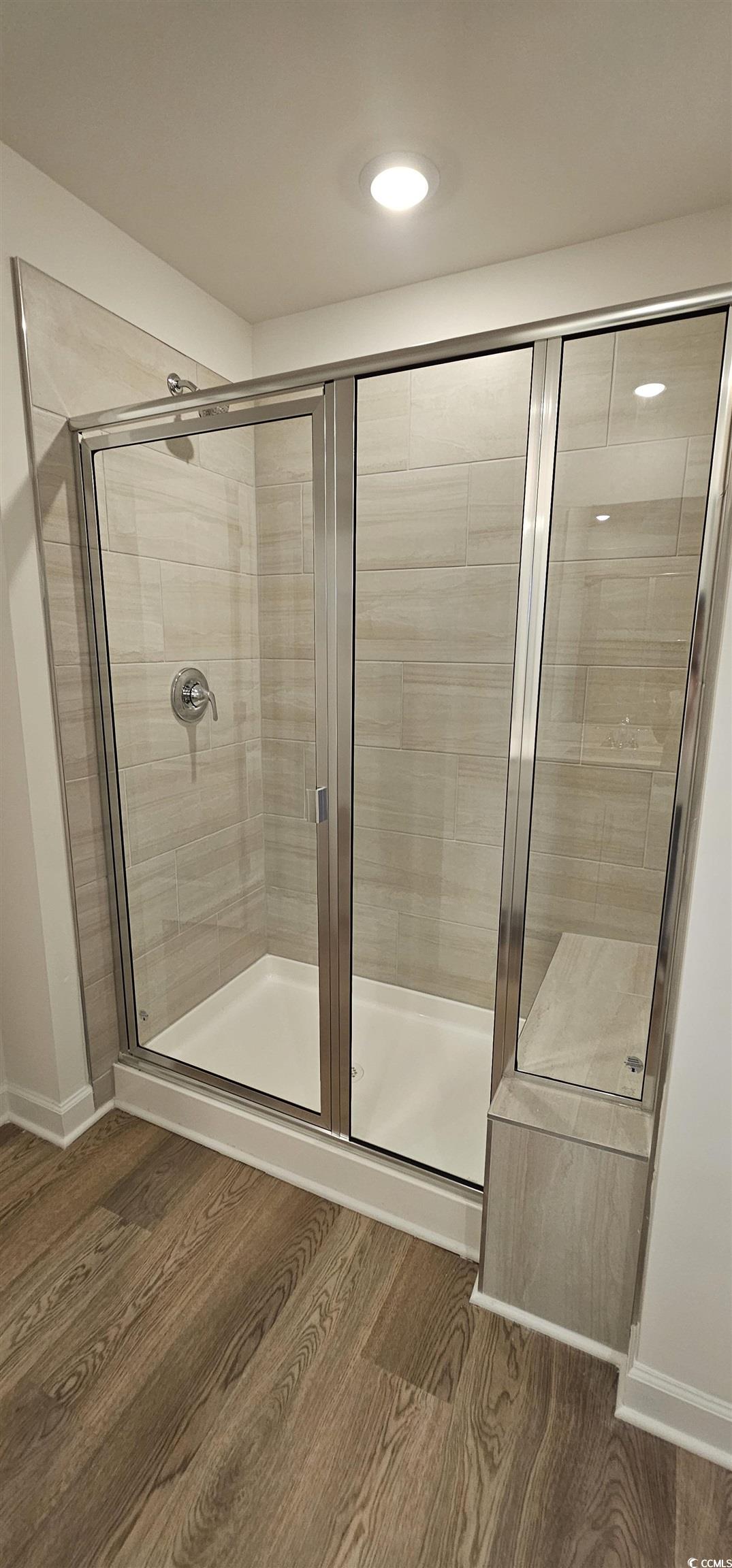 8233 Vibrant Loop Columbia, SC 29209 - Photo 24 of 40 Full bathroom with a shower stall, dark wood-type flooring, and recessed lighting