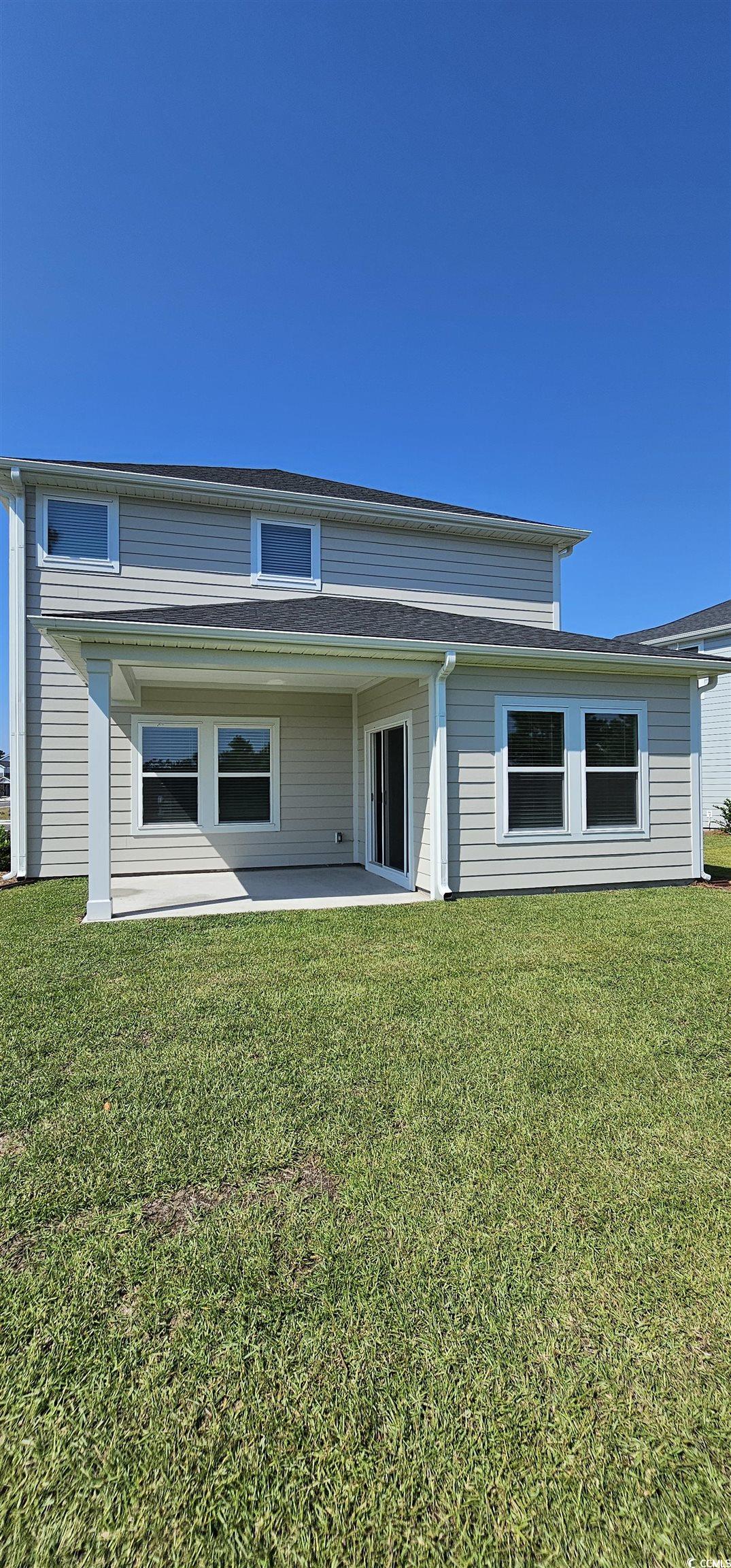 8233 Vibrant Loop Columbia, SC 29209 - Photo 37 of 40 Back of property featuring a patio and a yard