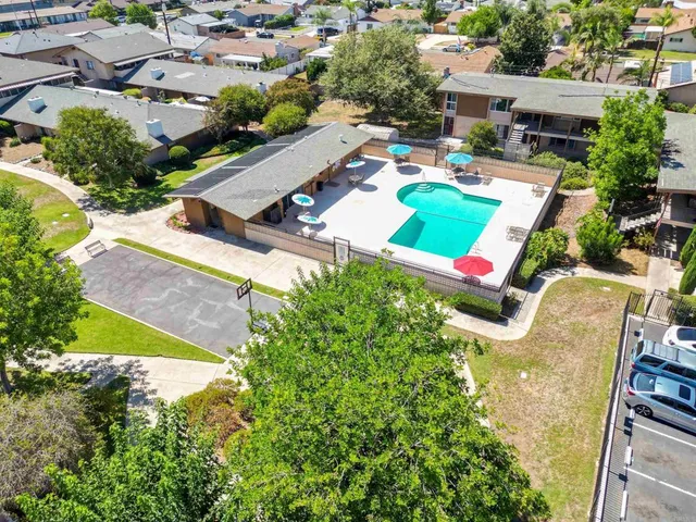 an aerial view of a house with a garden