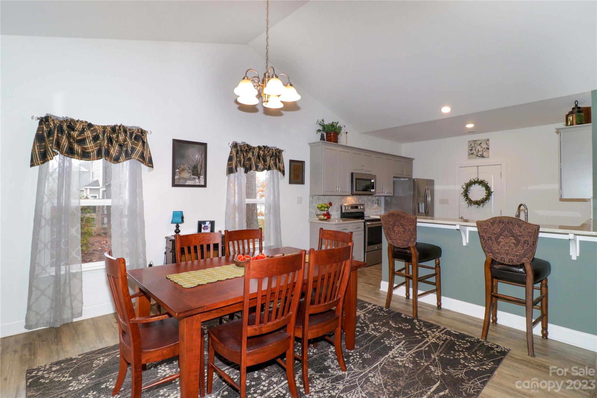 117 Windstone Drive Troutman, NC 28166 - Photo 14 of 40 a view of a dining room with furniture
