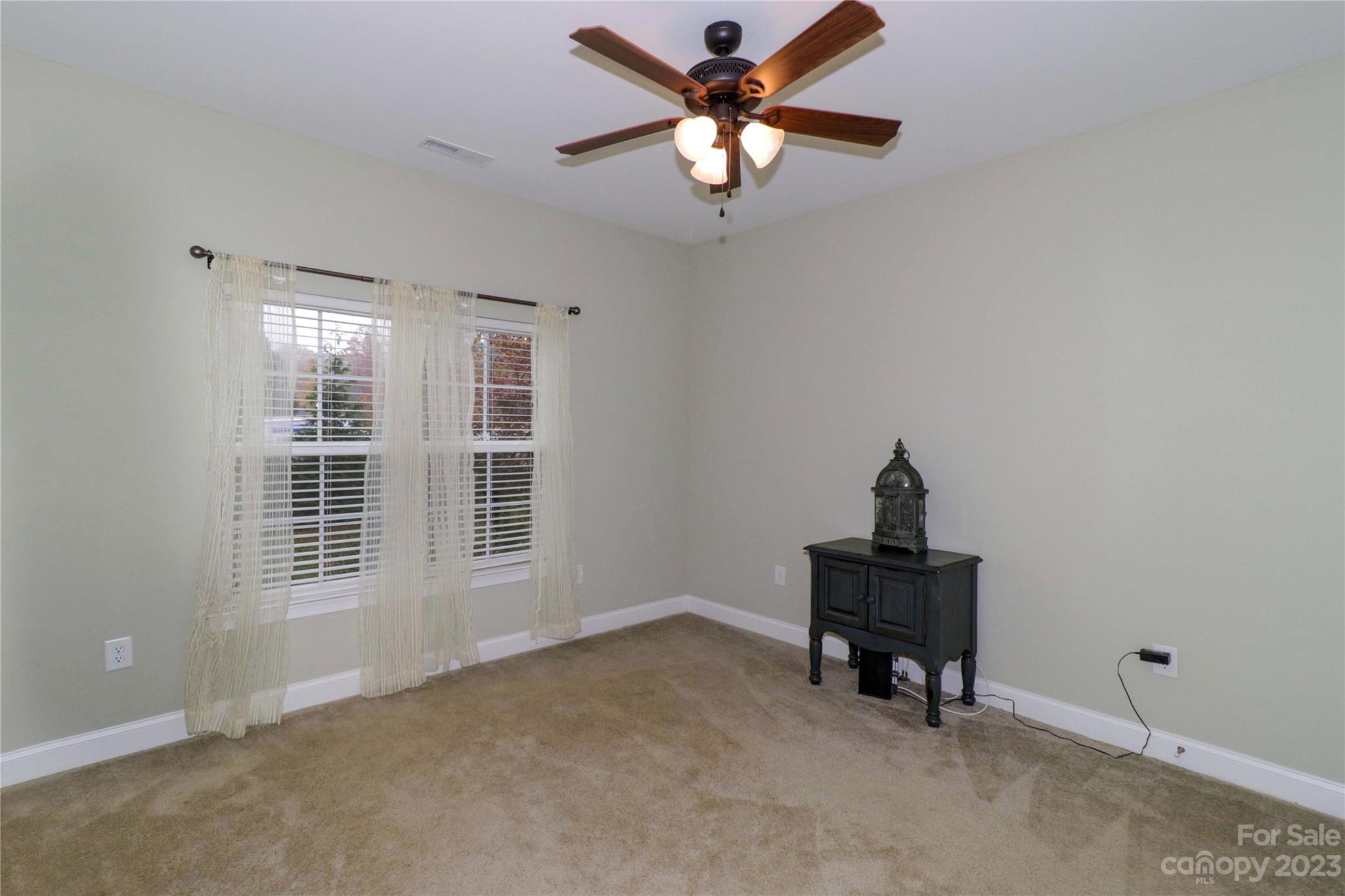 117 Windstone Drive Troutman, NC 28166 - Photo 26 of 40 a view of an empty room with a window