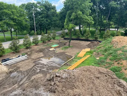a view of a park with a slide