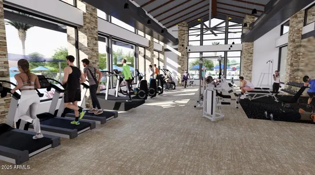 a living room with furniture a flat screen tv and a large window