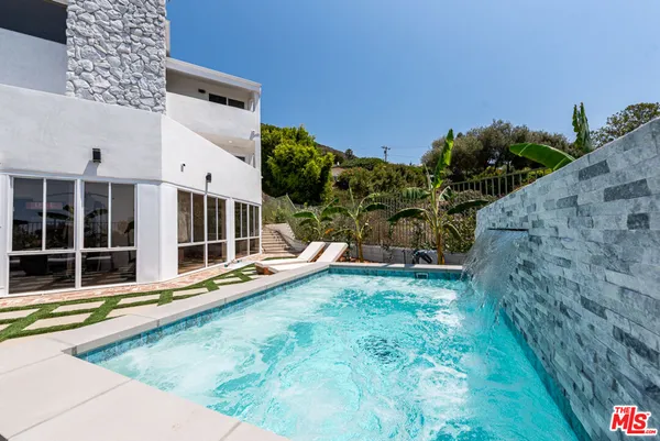 a view of a house with pool