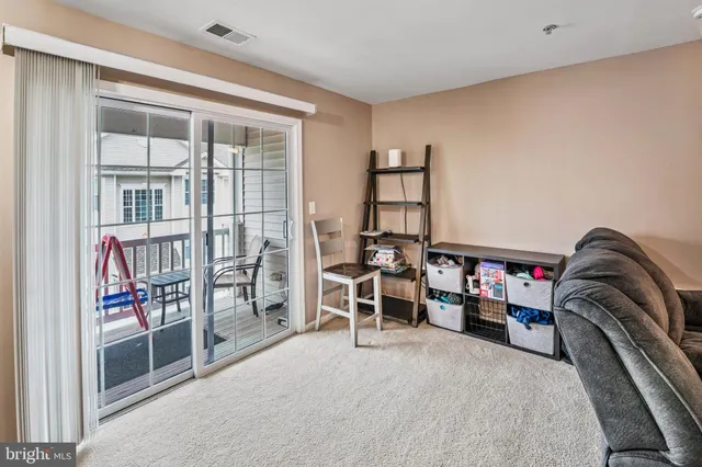 a view of a livingroom with furniture