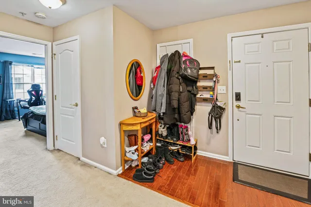 a front view of a building with a garden