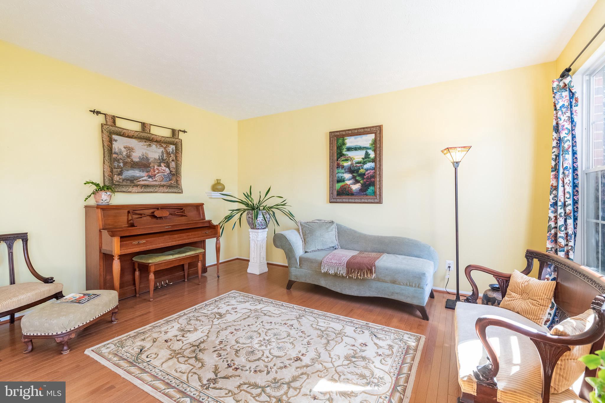 1907 Wagner Farm Road Bel Air, MD 21015 - Photo 5 of 67 a living room with furniture and a rug