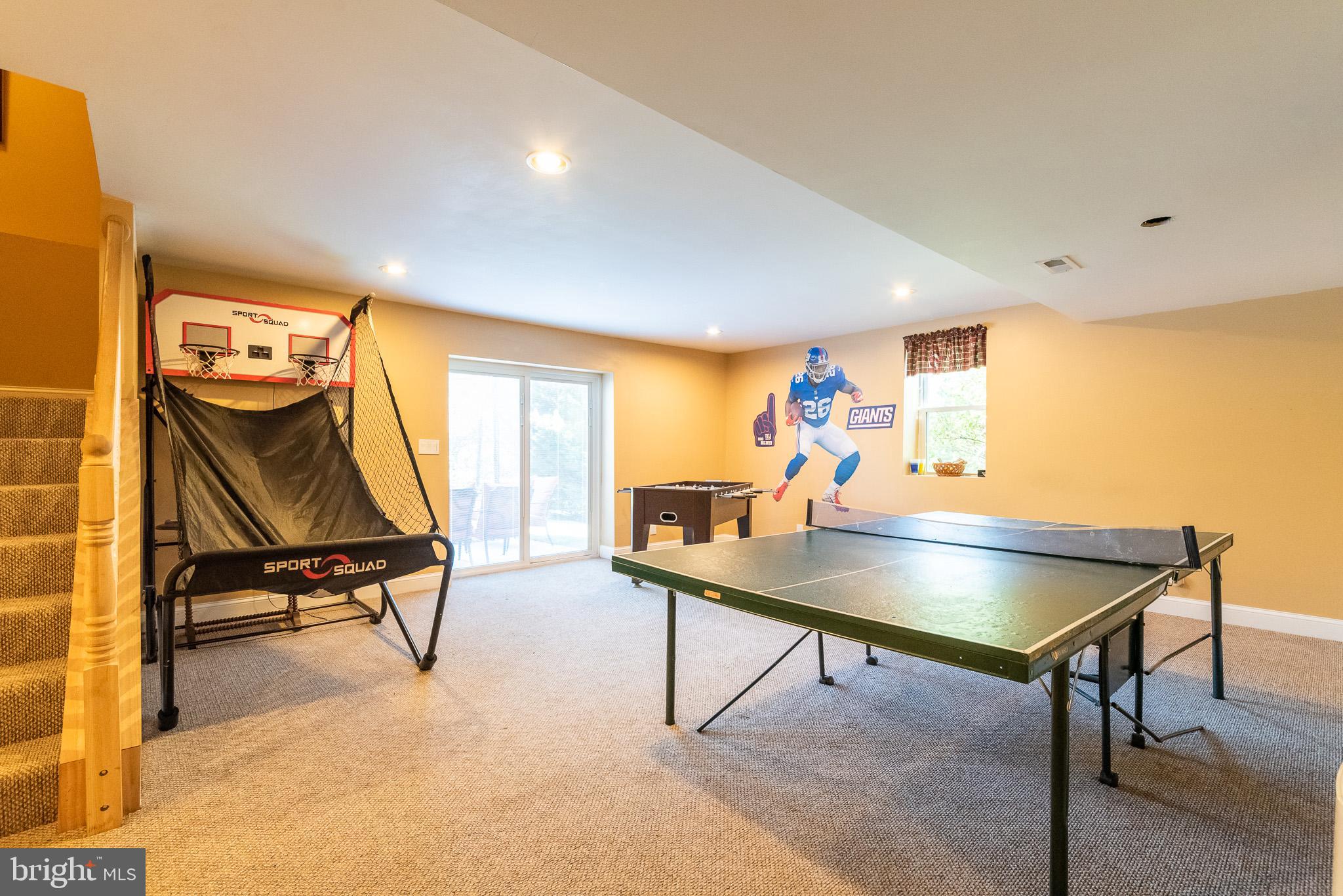 1907 Wagner Farm Road Bel Air, MD 21015 - Photo 42 of 67 a living room with furniture pool table and windows