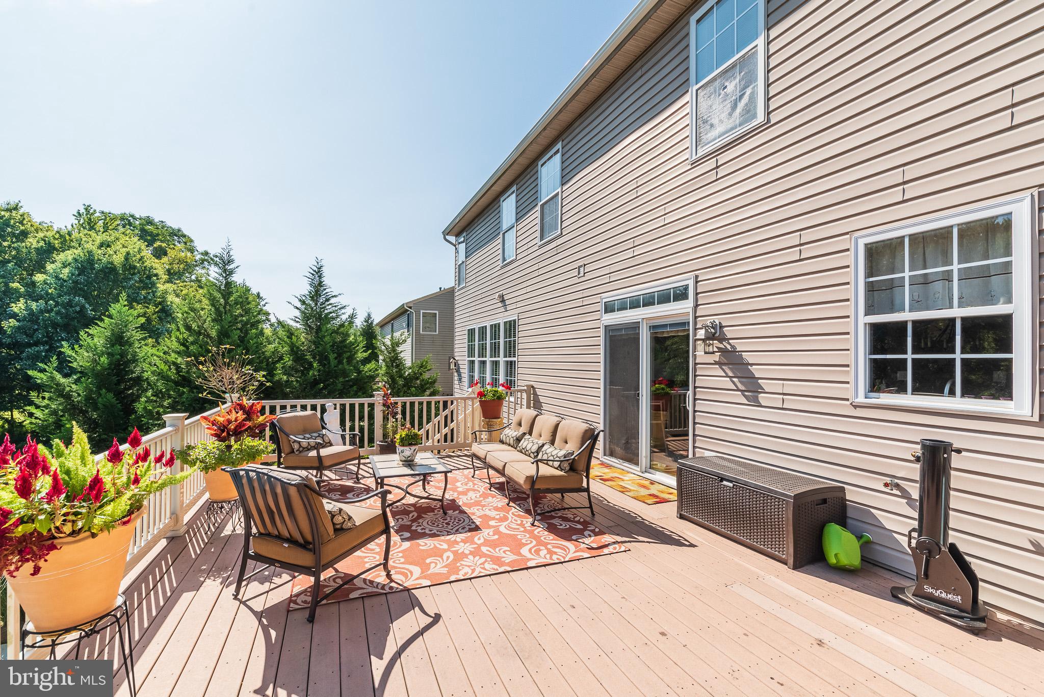 1907 Wagner Farm Road Bel Air, MD 21015 - Photo 52 of 67 a view of a patio with table and chairs and potted plants