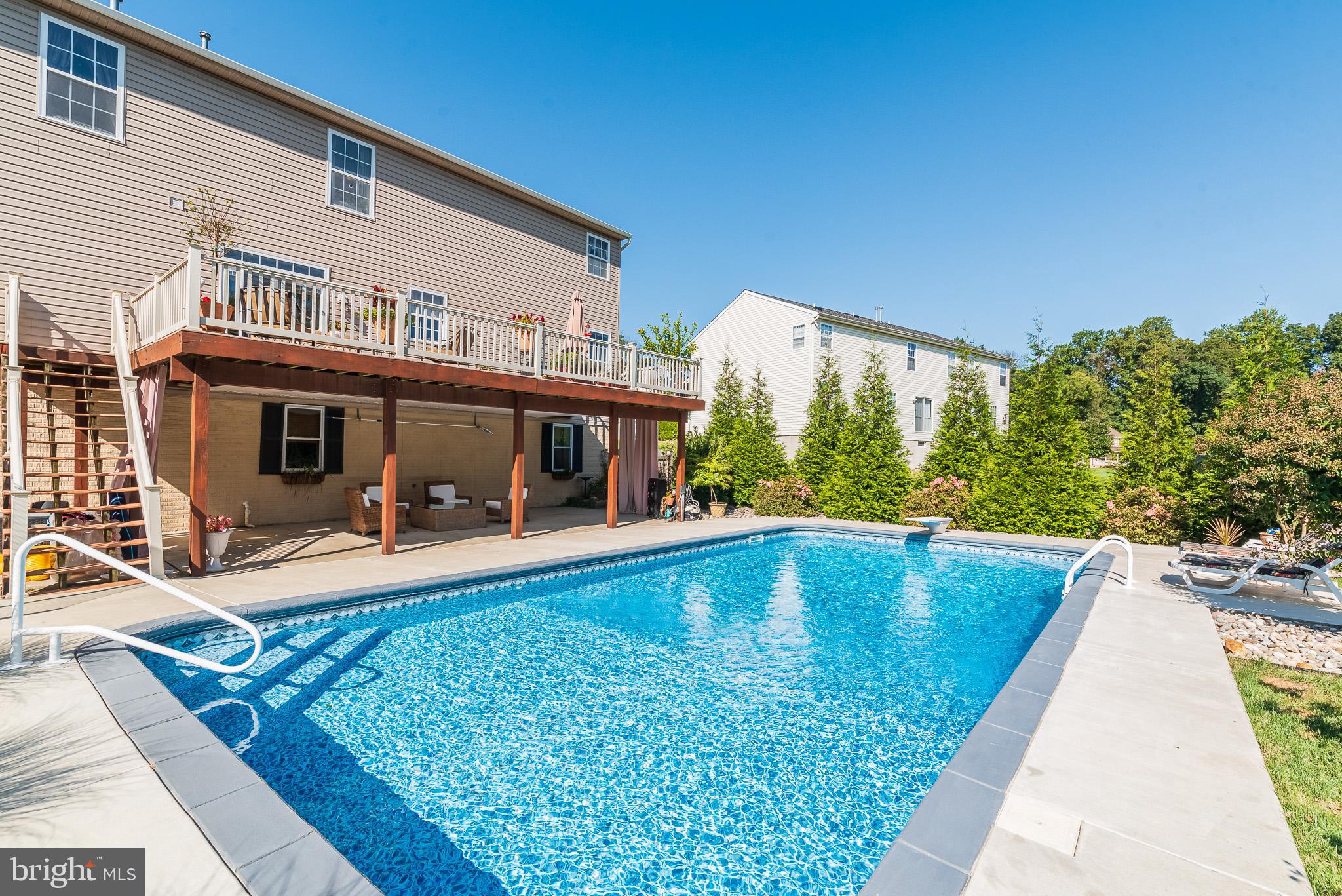 1907 Wagner Farm Road Bel Air, MD 21015 - Photo 56 of 67 a view of a house with swimming pool and sitting area
