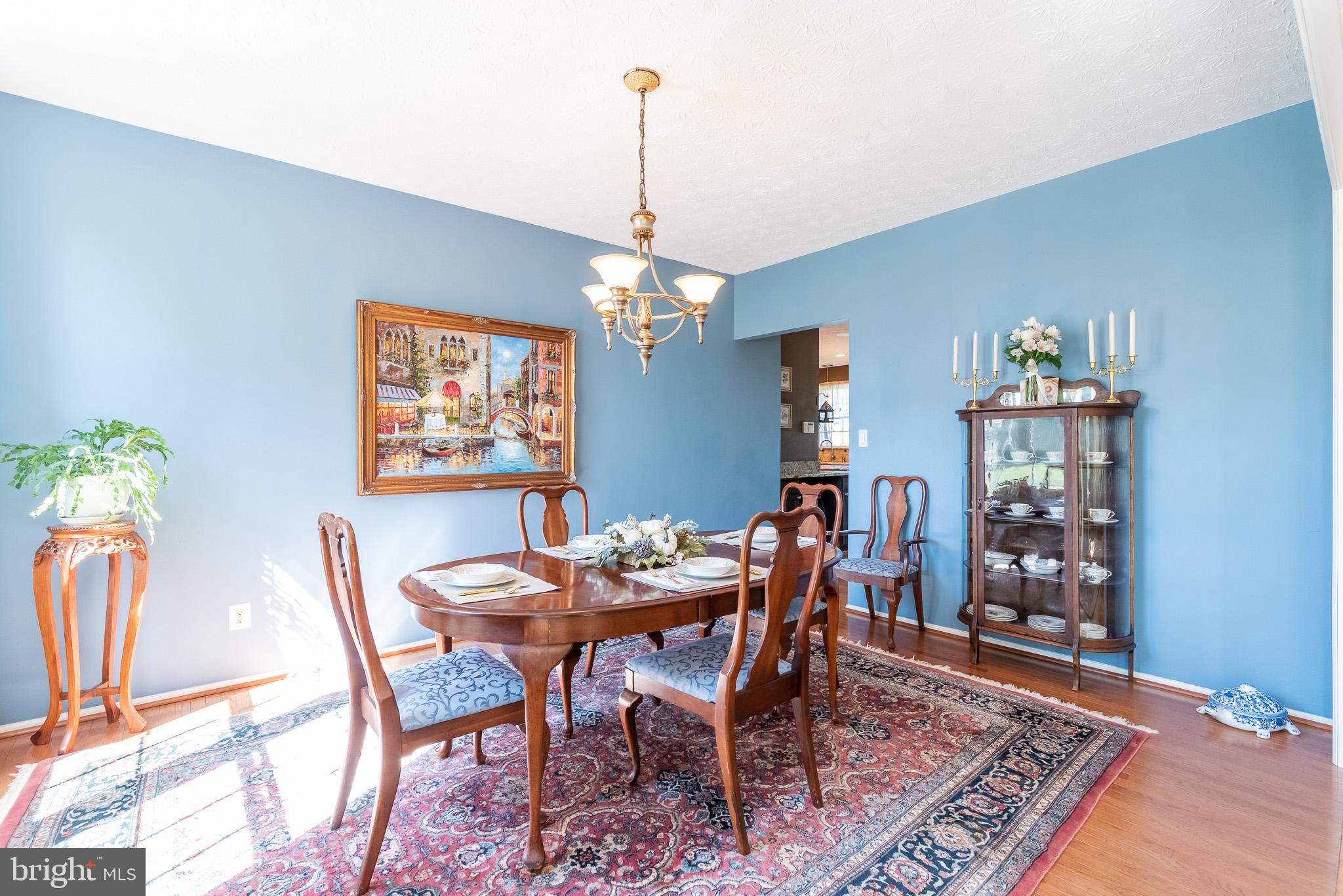 1907 Wagner Farm Road Bel Air, MD 21015 - Photo 7 of 67 a view of a dining room with furniture window and wooden floor
