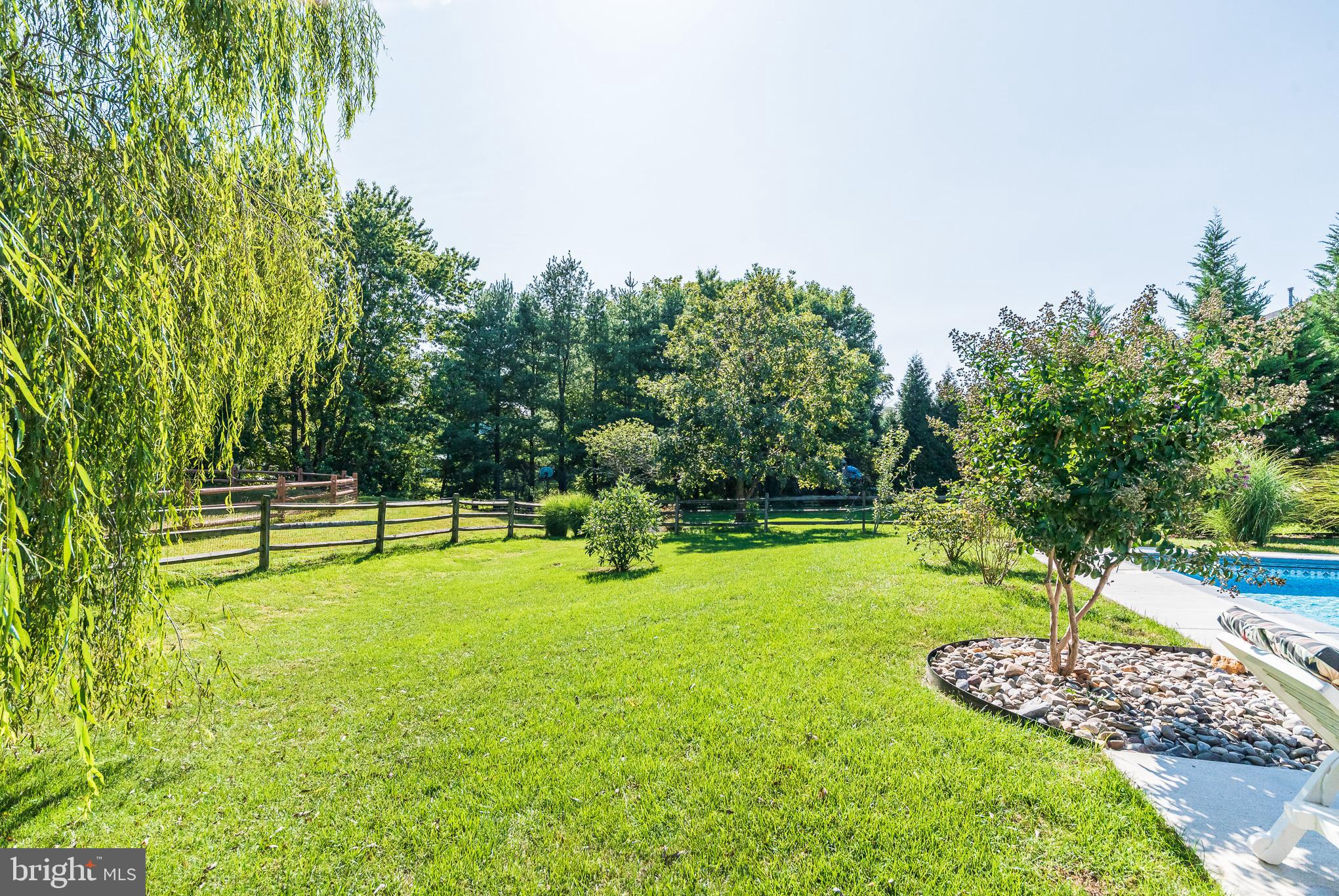 1907 Wagner Farm Road Bel Air, MD 21015 - Photo 64 of 67 a swimming pool with trees in the background