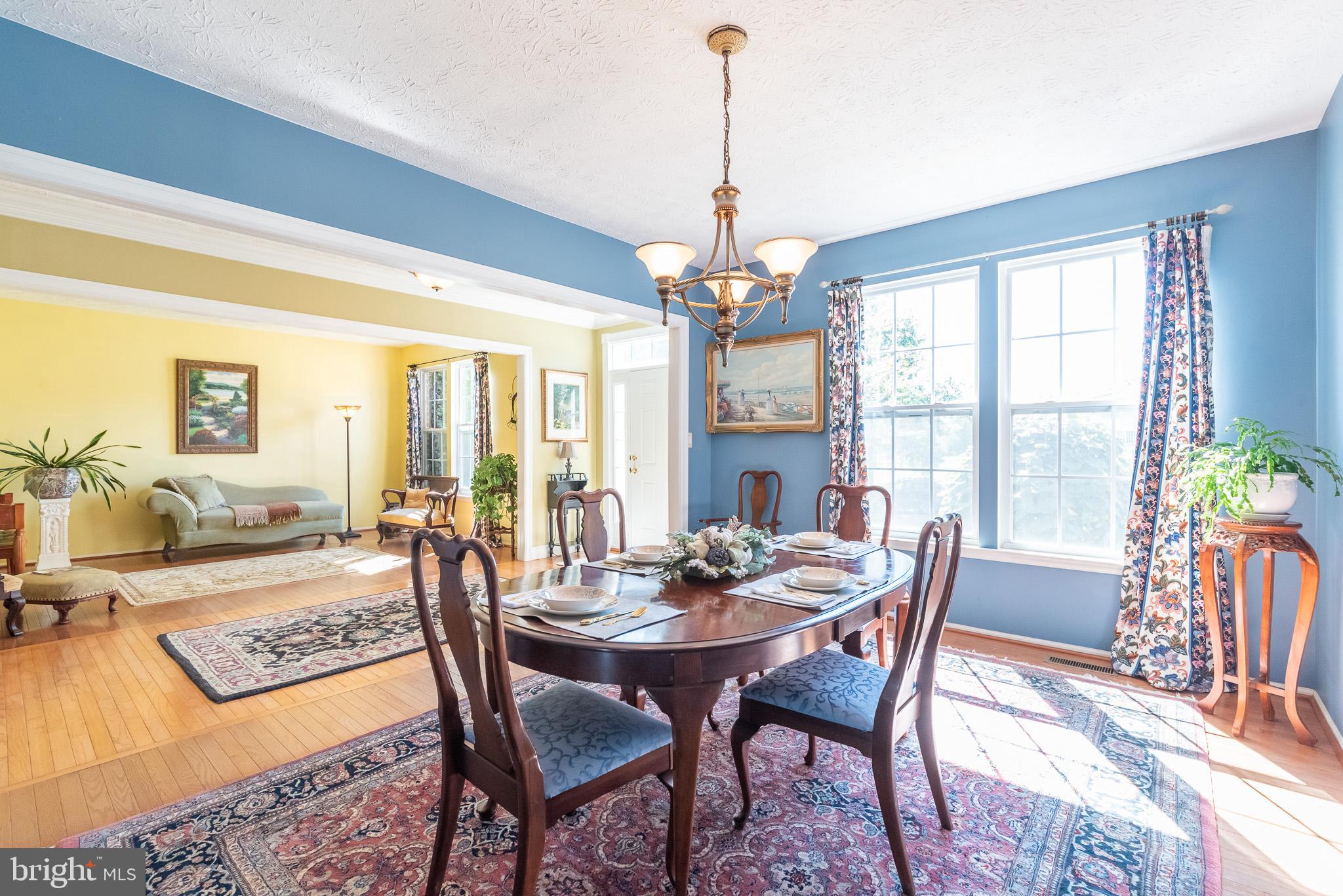 1907 Wagner Farm Road Bel Air, MD 21015 - Photo 8 of 67 a view of a dining room with furniture window and wooden floor