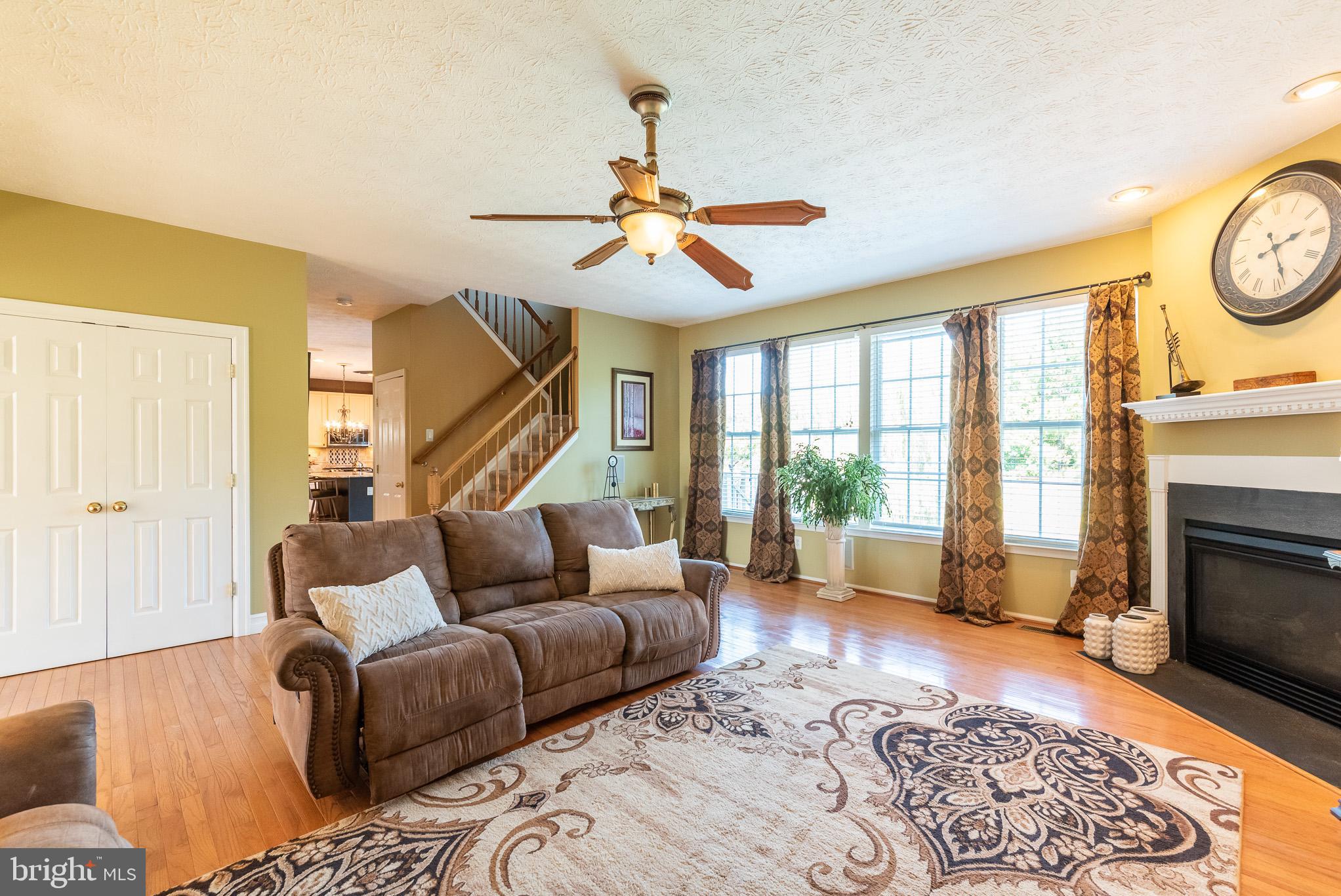 1907 Wagner Farm Road Bel Air, MD 21015 - Photo 10 of 67 a living room with furniture and a fireplace