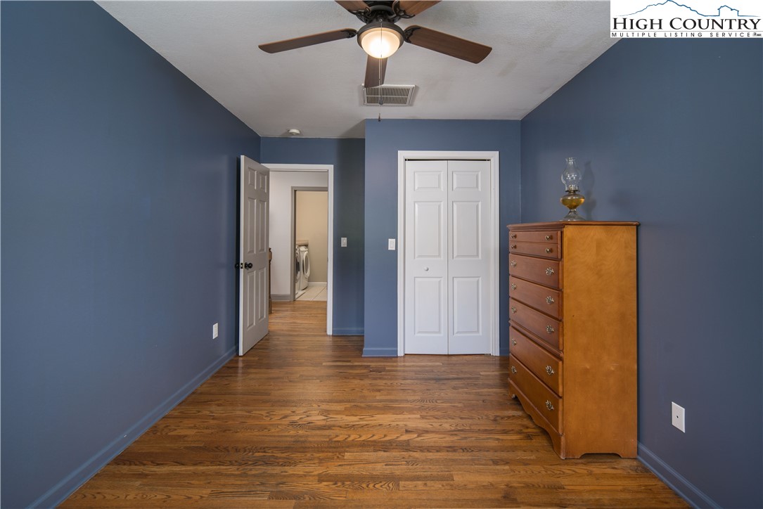 1527 Mabel School Road Zionville, NC 28698 - Photo 28 of 49 a view of empty room with wooden floor
