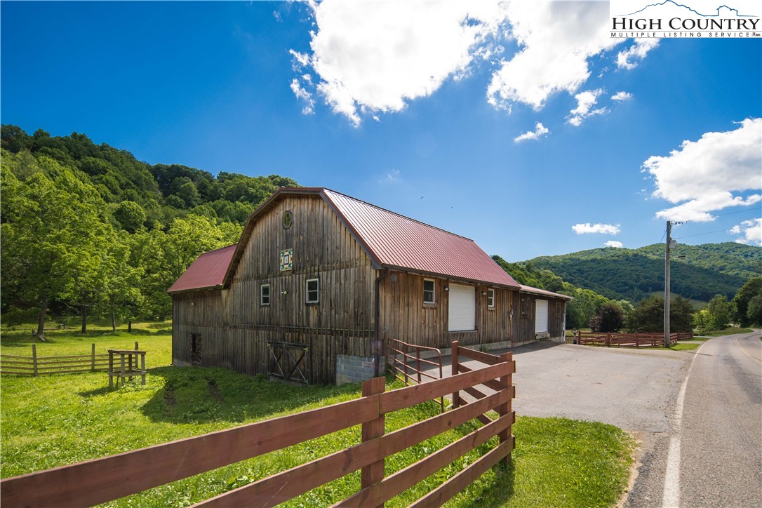 1527 Mabel School Road Zionville, NC 28698 - Photo 40 of 49 a view of a house with backyard and sitting area