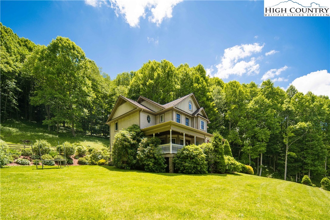 1527 Mabel School Road Zionville, NC 28698 - Photo 4 of 49 a front view of a house with a yard