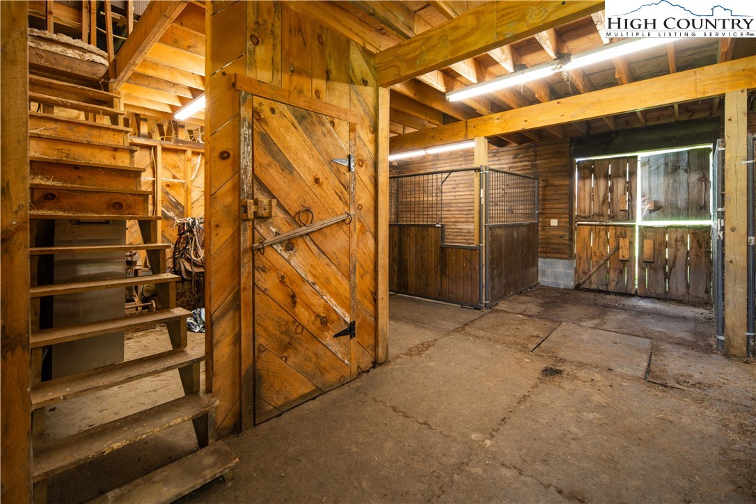 1527 Mabel School Road Zionville, NC 28698 - Photo 44 of 49 a view of a room with wooden walls