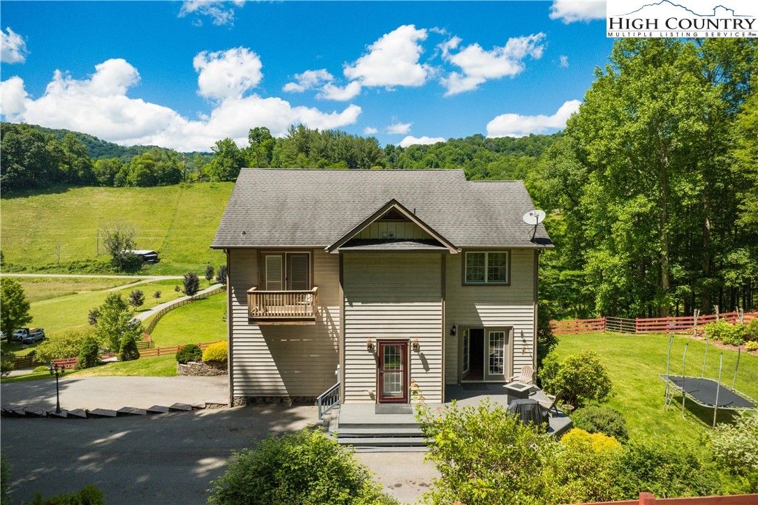 1527 Mabel School Road Zionville, NC 28698 - Photo 49 of 49 an aerial view of a house with a garden