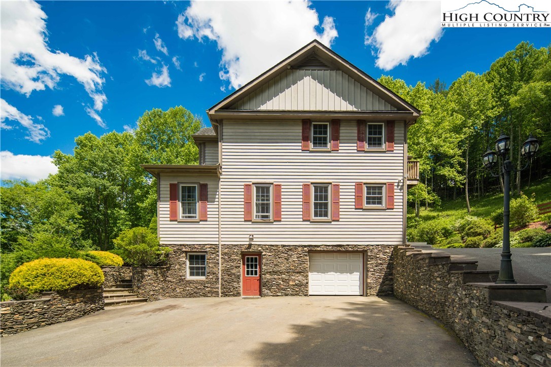 1527 Mabel School Road Zionville, NC 28698 - Photo 7 of 49 a front view of a house with a yard