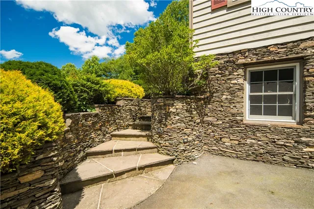 a view of a livingroom with furniture and hardwood floor