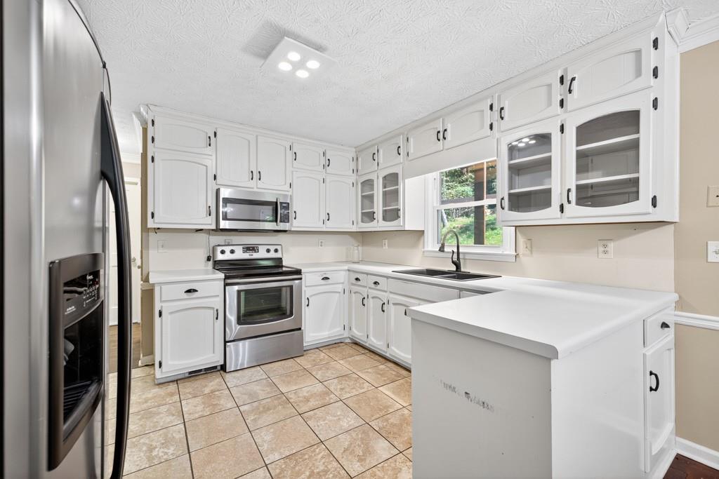 262 Harmony Grove Road Lilburn, GA 30047 - Photo 10 of 35