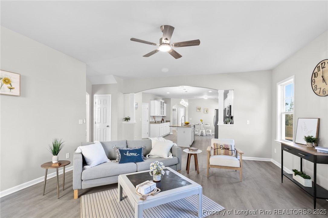 516 Heathrow Drive Spring Lake, NC 28390 - Photo 11 of 42 a living room with furniture and a large window