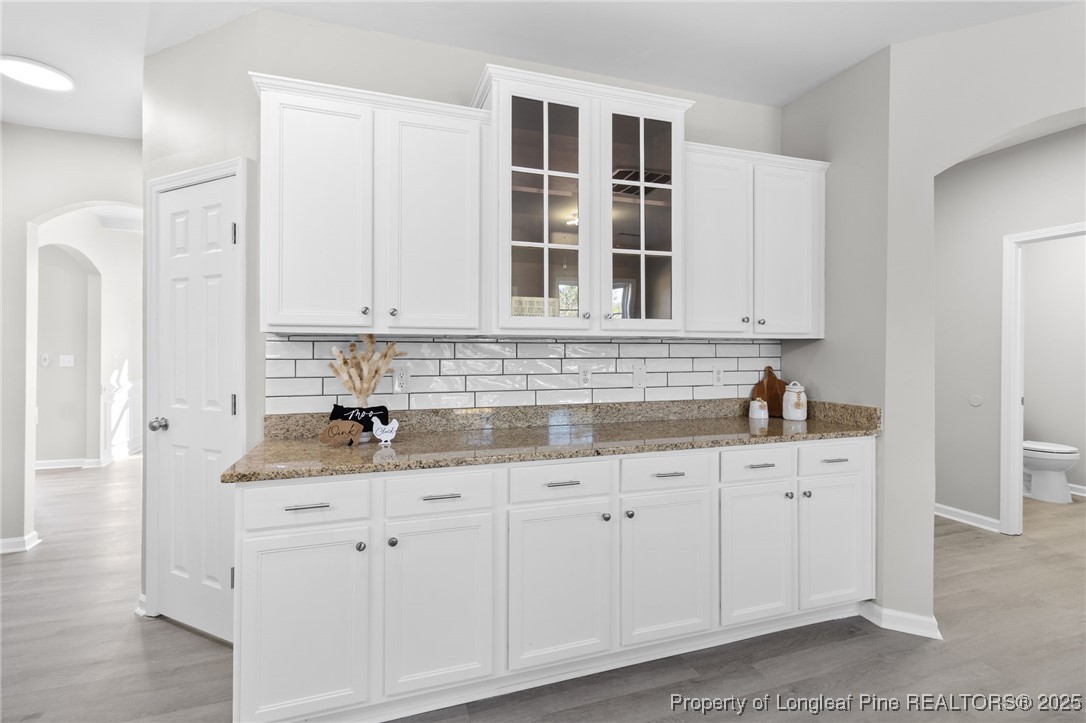 516 Heathrow Drive Spring Lake, NC 28390 - Photo 13 of 42 a kitchen with stainless steel appliances granite countertop a sink and cabinets