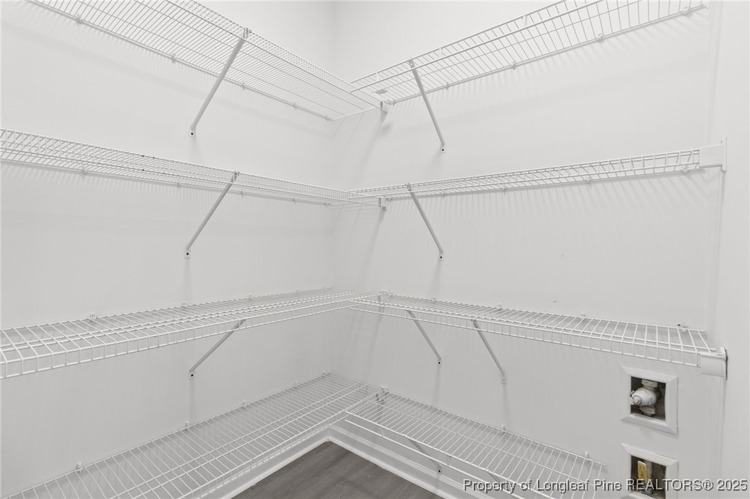 516 Heathrow Drive Spring Lake, NC 28390 - Photo 22 of 42 a view of a rack on the wall