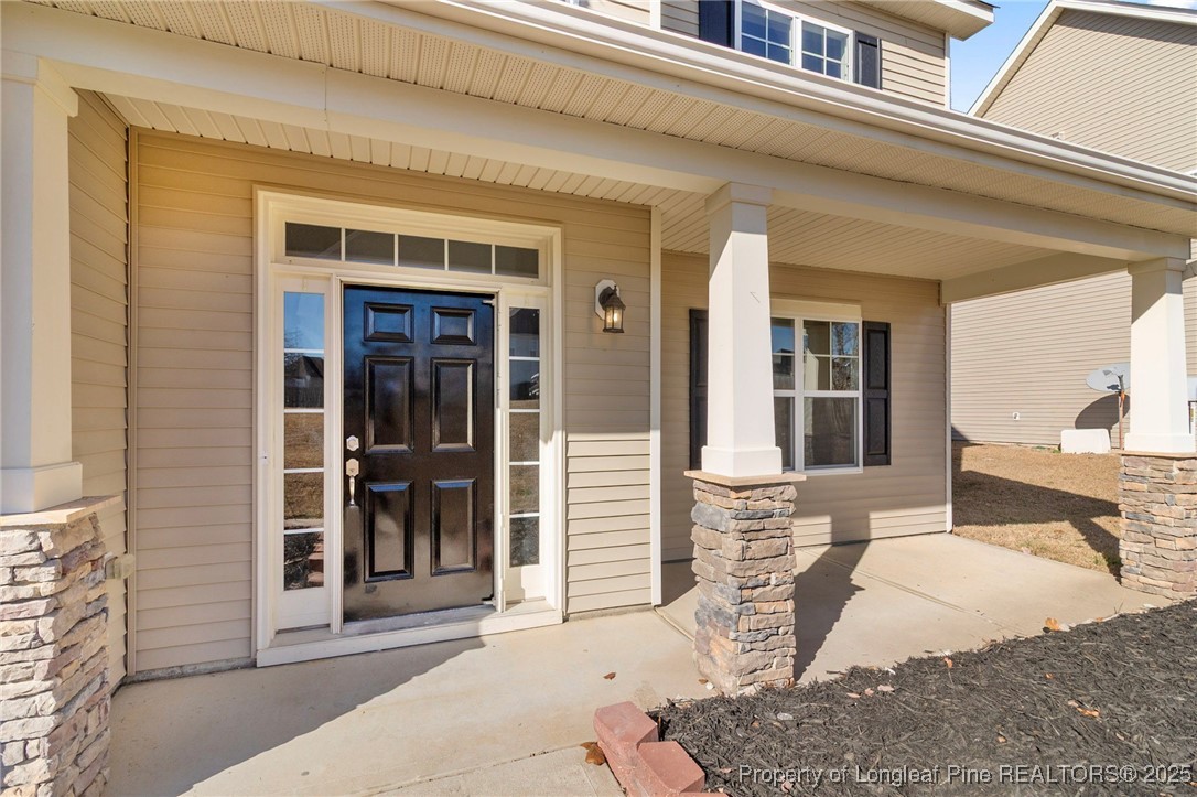 516 Heathrow Drive Spring Lake, NC 28390 - Photo 3 of 42 a view of a house with a outdoor space