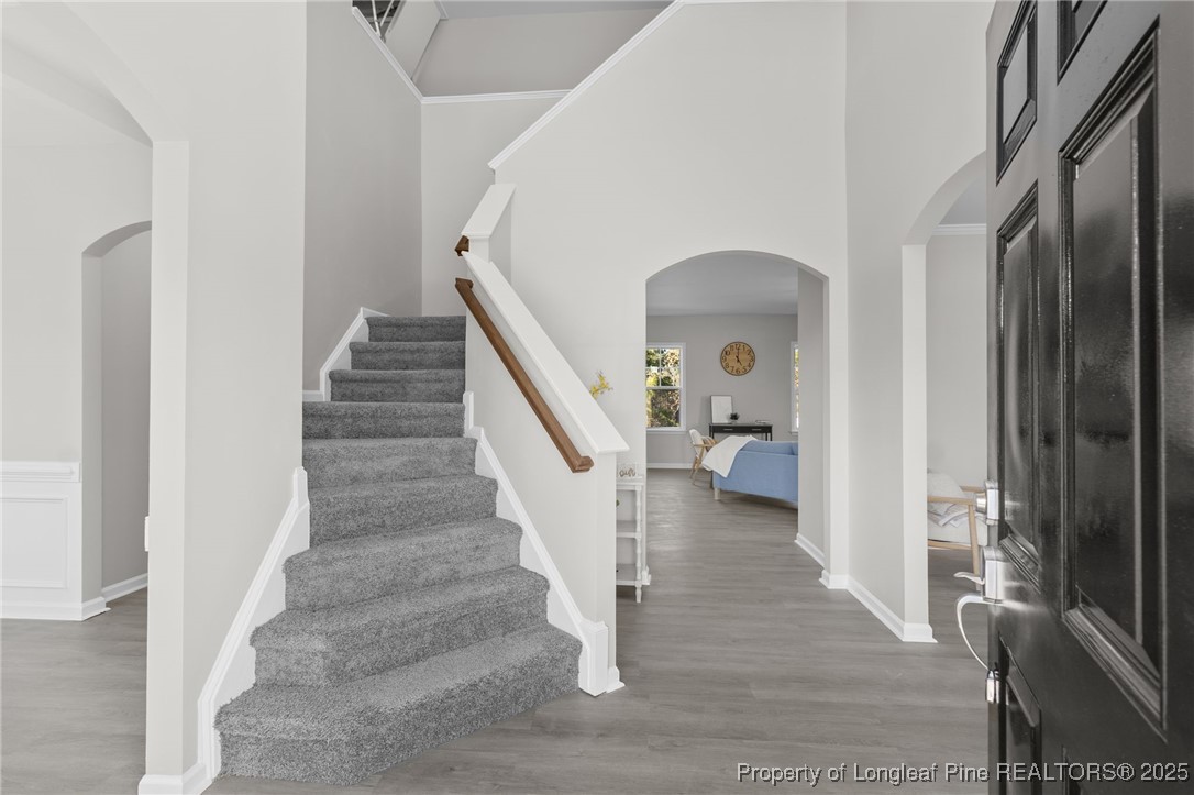 516 Heathrow Drive Spring Lake, NC 28390 - Photo 4 of 42 a view of entryway and hall with wooden floor