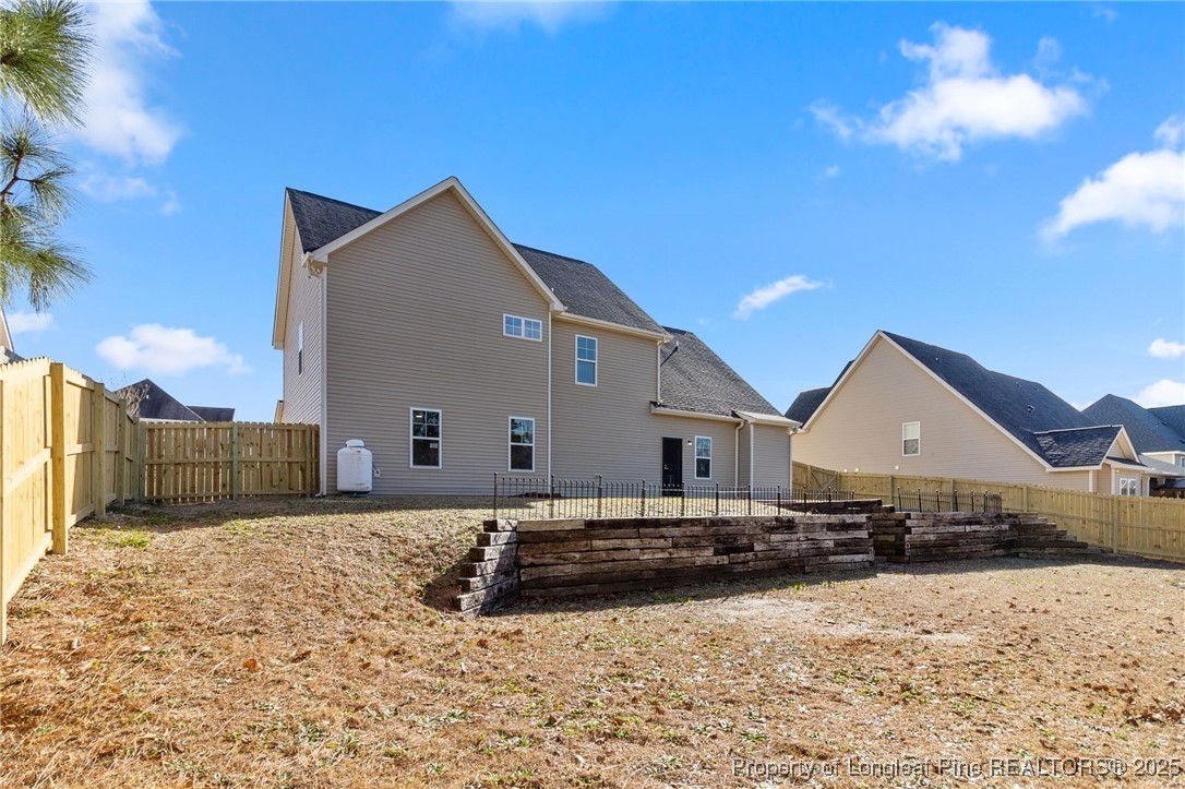 516 Heathrow Drive Spring Lake, NC 28390 - Photo 42 of 42 a front view of a house with a yard