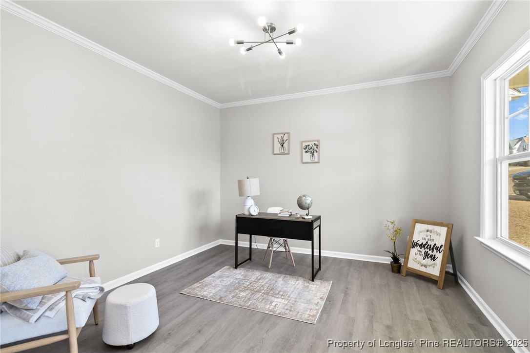 516 Heathrow Drive Spring Lake, NC 28390 - Photo 5 of 42 a living room with furniture and a window