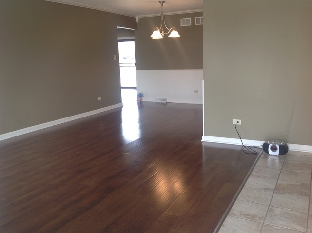 617 Quail Run Road Matteson, IL 60443 - Photo 3 of 13 a view of a hallway with wooden floor