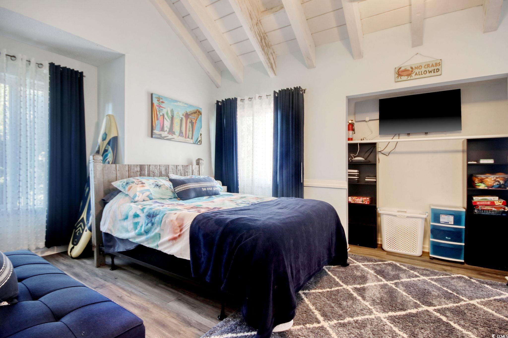 503 Pinewood Road, Unit 2H Myrtle Beach, SC 29577 - Photo 11 of 34 Bedroom with wood finished floors