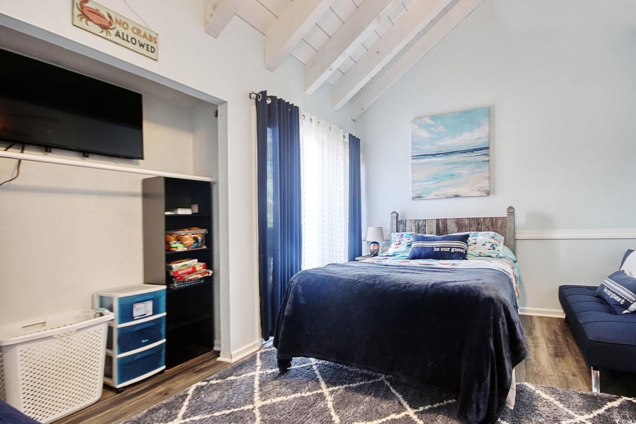 503 Pinewood Road, Unit 2H Myrtle Beach, SC 29577 - Photo 12 of 34 Bedroom with dark wood-type flooring