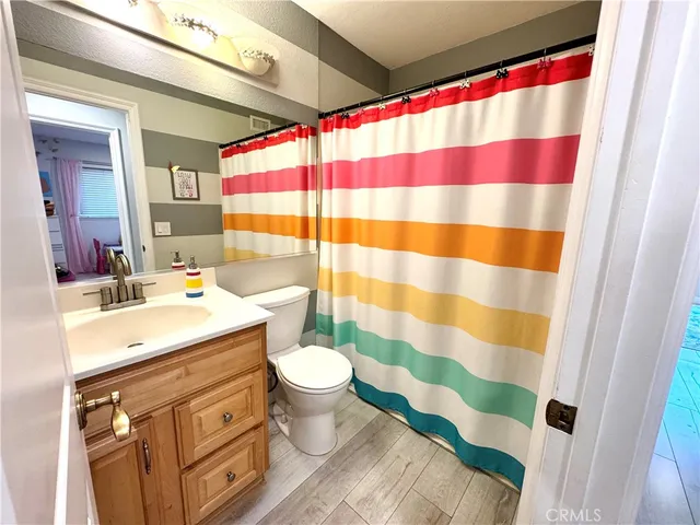 a bed room with a bed and a desk