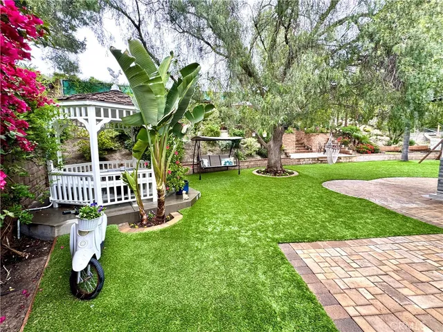 a view of a garden with a bench