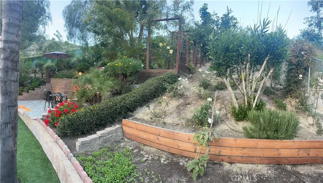 a view of a park with swings