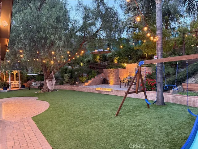 a view of street with flower plants