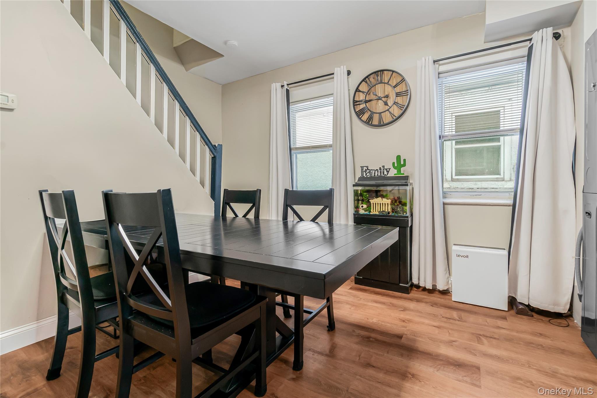 85-14 Sutter Avenue Queens, NY 11417 - Photo 11 of 27 Dining space featuring light wood-style floors